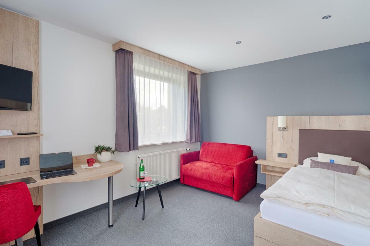 Akzent Hotel Cordes & Restaurant Am Rosengarten Sottorf Kültér fotó